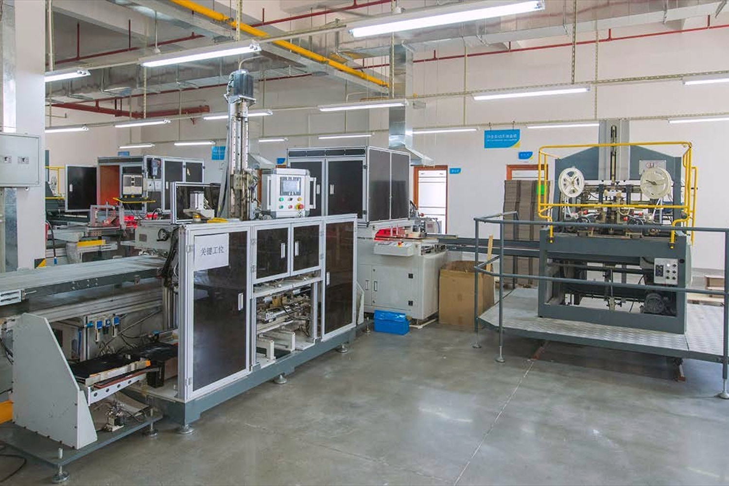 Automated box production equipment at the Dongguan factory